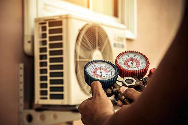 Professional Air Conditioning Service technician working in Kingman, KS